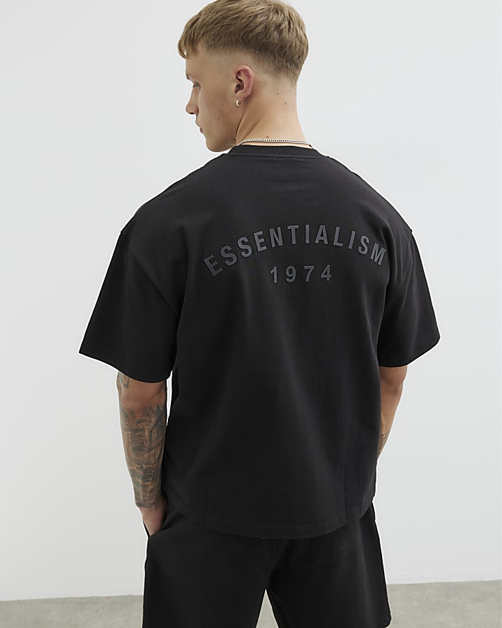 Black Oversized Essentialism 1974 T-Shirt